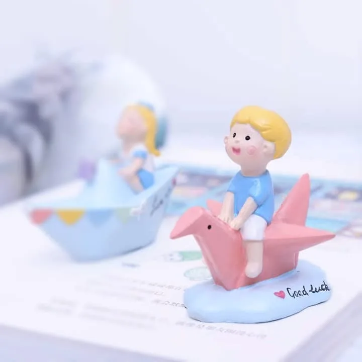 Boy on Paper Crane Good Luck Showpiece thumbnail 1